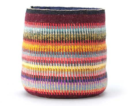 Joe Feddersen (Colville Confederated Tribes, born 1953), Multi-colored Basket, 1994, Tapestry wool linen with cloth, Museum Purchase: Eiteljorg Fellowship