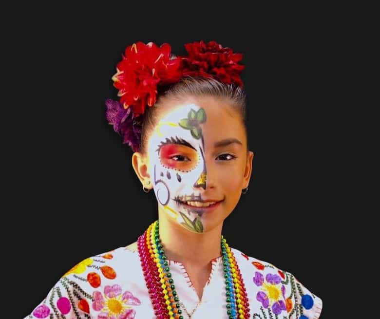 Close up of girl with painted face for Dia De Muertos at the Eiteljorg