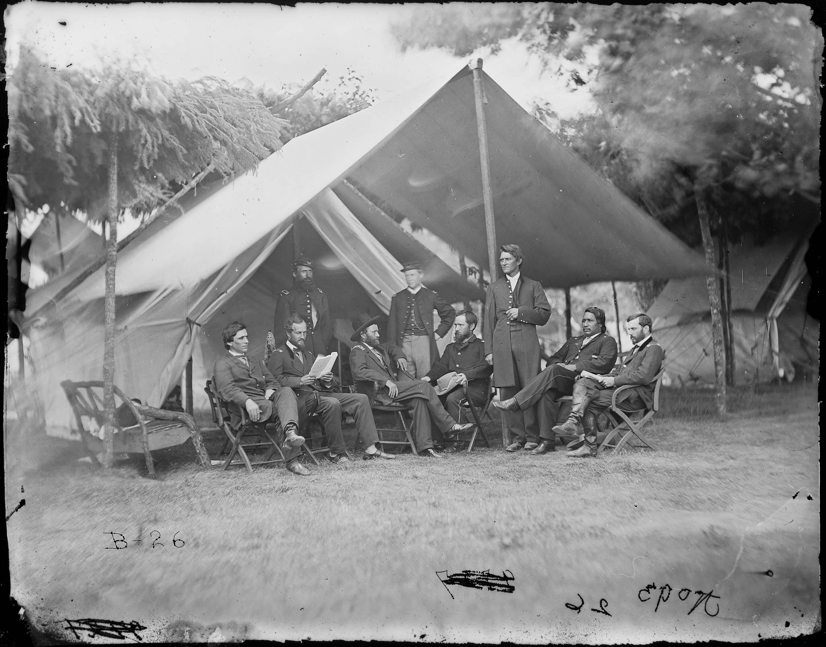 General Ulysses S. Grant (fourth from left) and his staff, including Lieutenant Colonel Ely S. Parker (Seneca, 1828–1895, second from the right), late spring, 1864. Photo by Mathew Brady. National Archives and Records Administration 524444